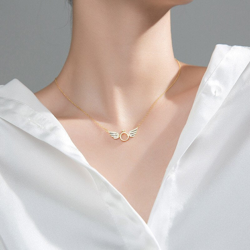 Glänzende Halskette mit Engelsflügel ™️ - Lozenza